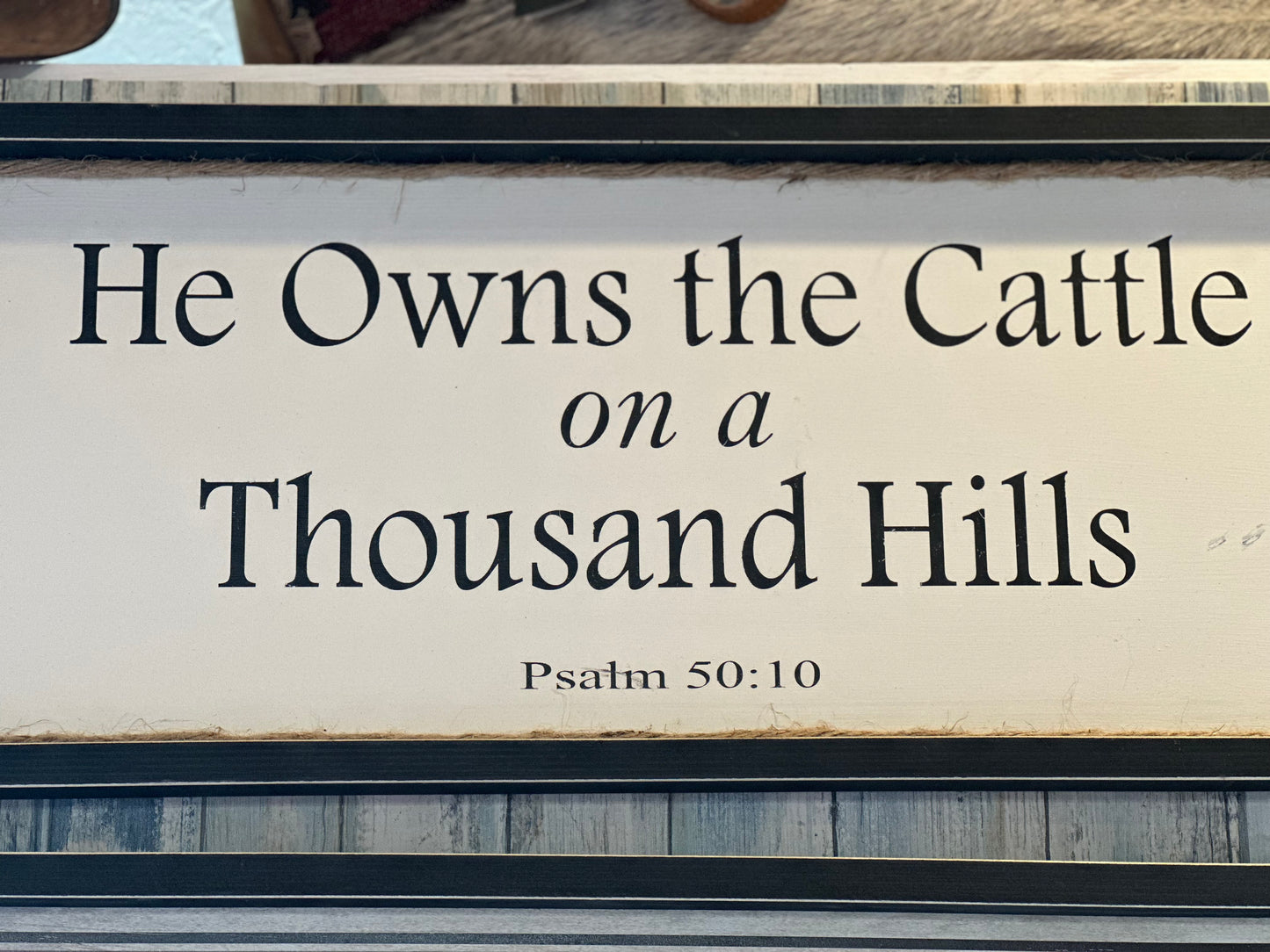 He Owns the Cattle on a Thousand Hills Sign