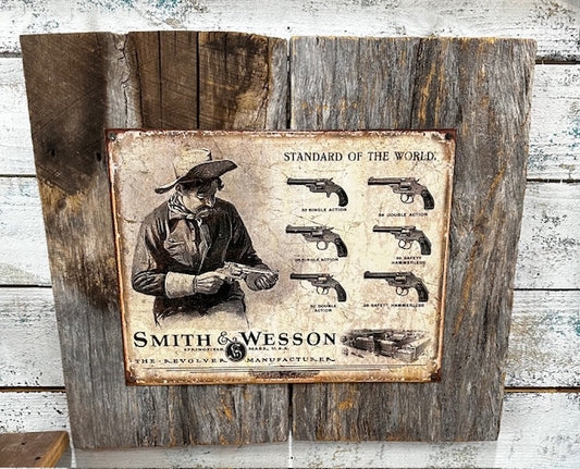 Metal Sign of Smith & Wesson Guns Mounted on Barnwood