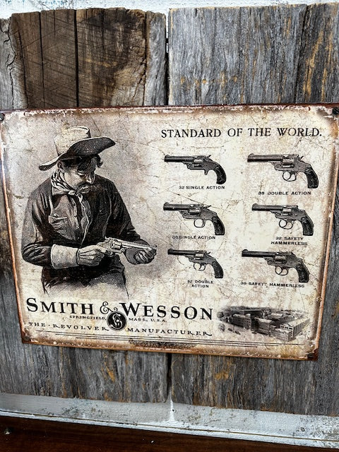 Metal Sign of Smith & Wesson Guns Mounted on Barnwood